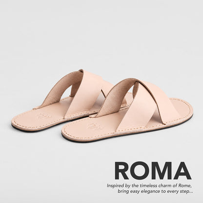 Crema | Flat leather sandals with debossed PLG three tree logo in sole, text reads "Roma. Inspired by the timeless charm of Rome, bring easy elegance to every step..."