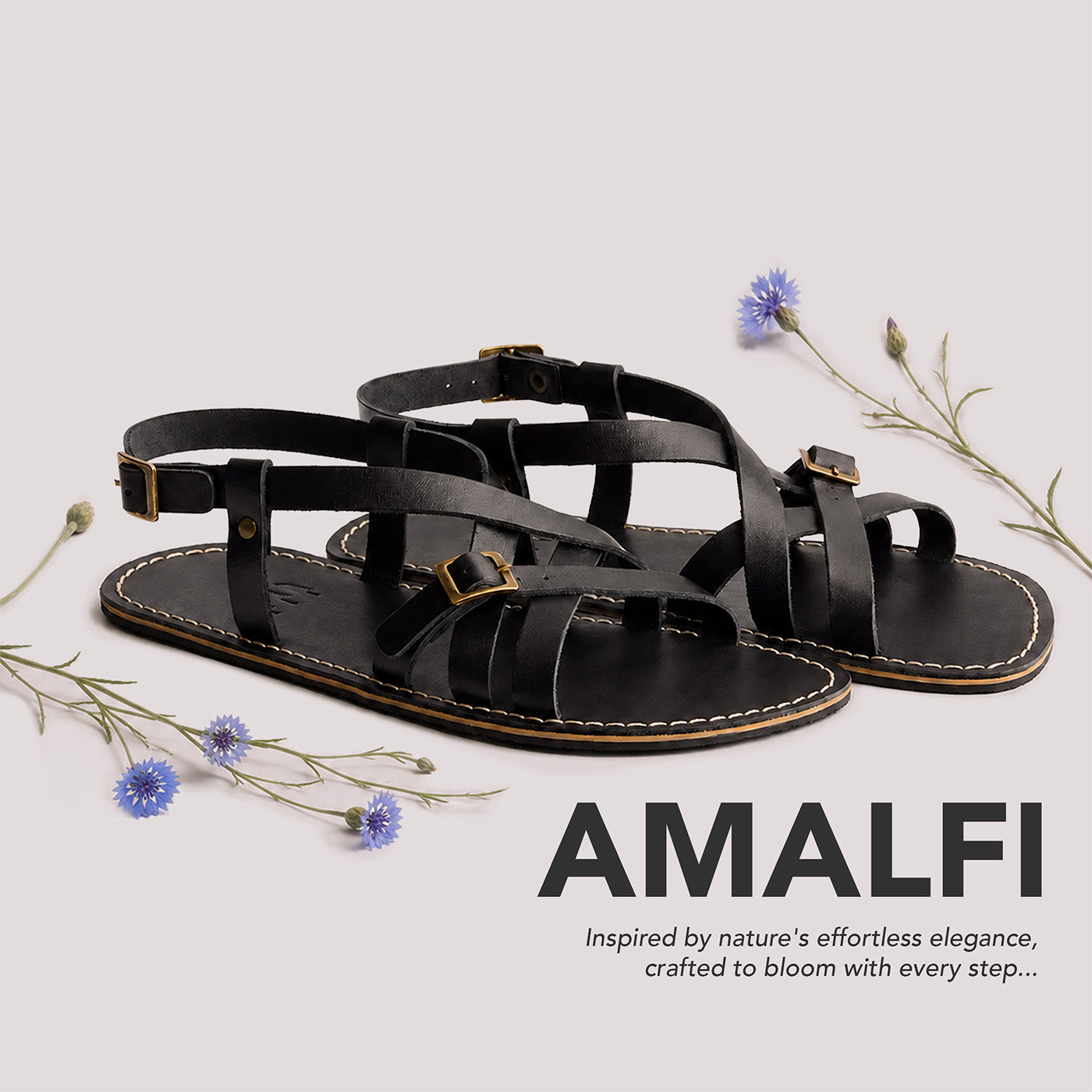 Nero | Strappy leather sandals with two buckle accents