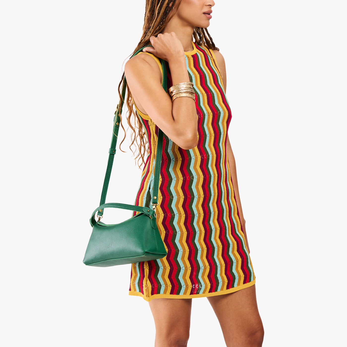 Bacalar | Model holding a green bowler style hand bag