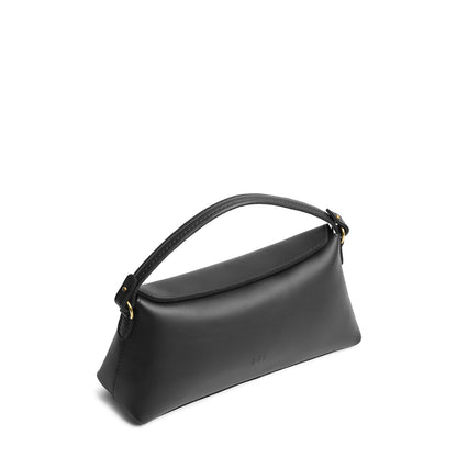 Black | Leather bowler bag with magnetic closure against a white background