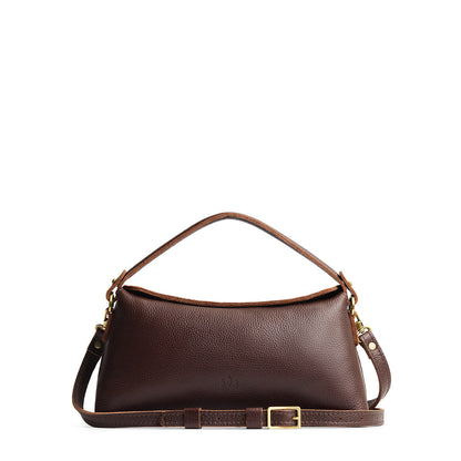 Coldbrew | Leather bowler bag with magnetic closure against a white background
