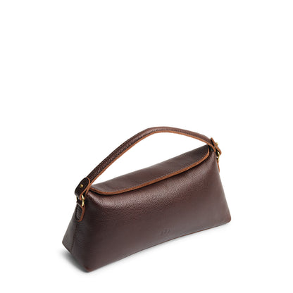 Coldbrew | Leather bowler bag with magnetic closure against a white background