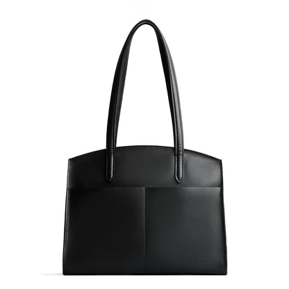 Black*Large | Leather tote bag with handles, adjustable crossbody strap, zipper top, and two back pockets