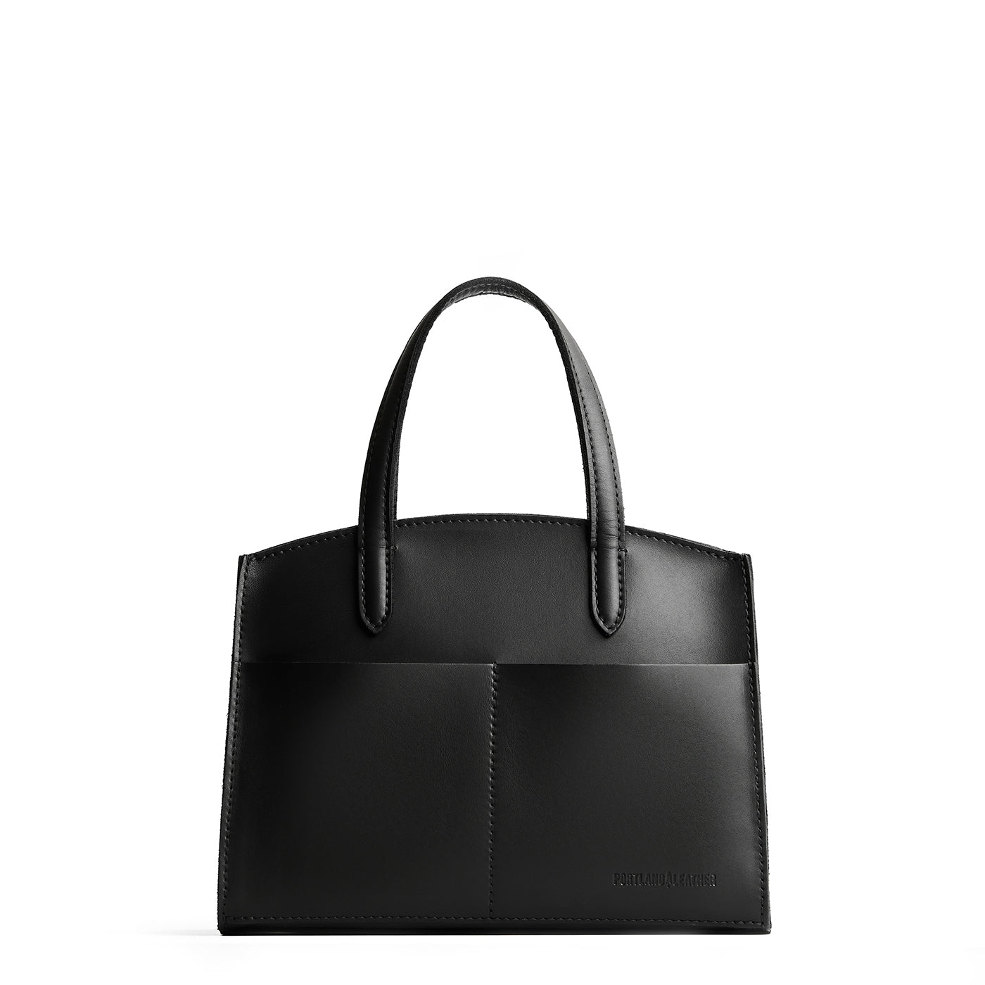 Black*Medium| Leather tote bag with handles, adjustable crossbody strap, zipper top, and two back pockets