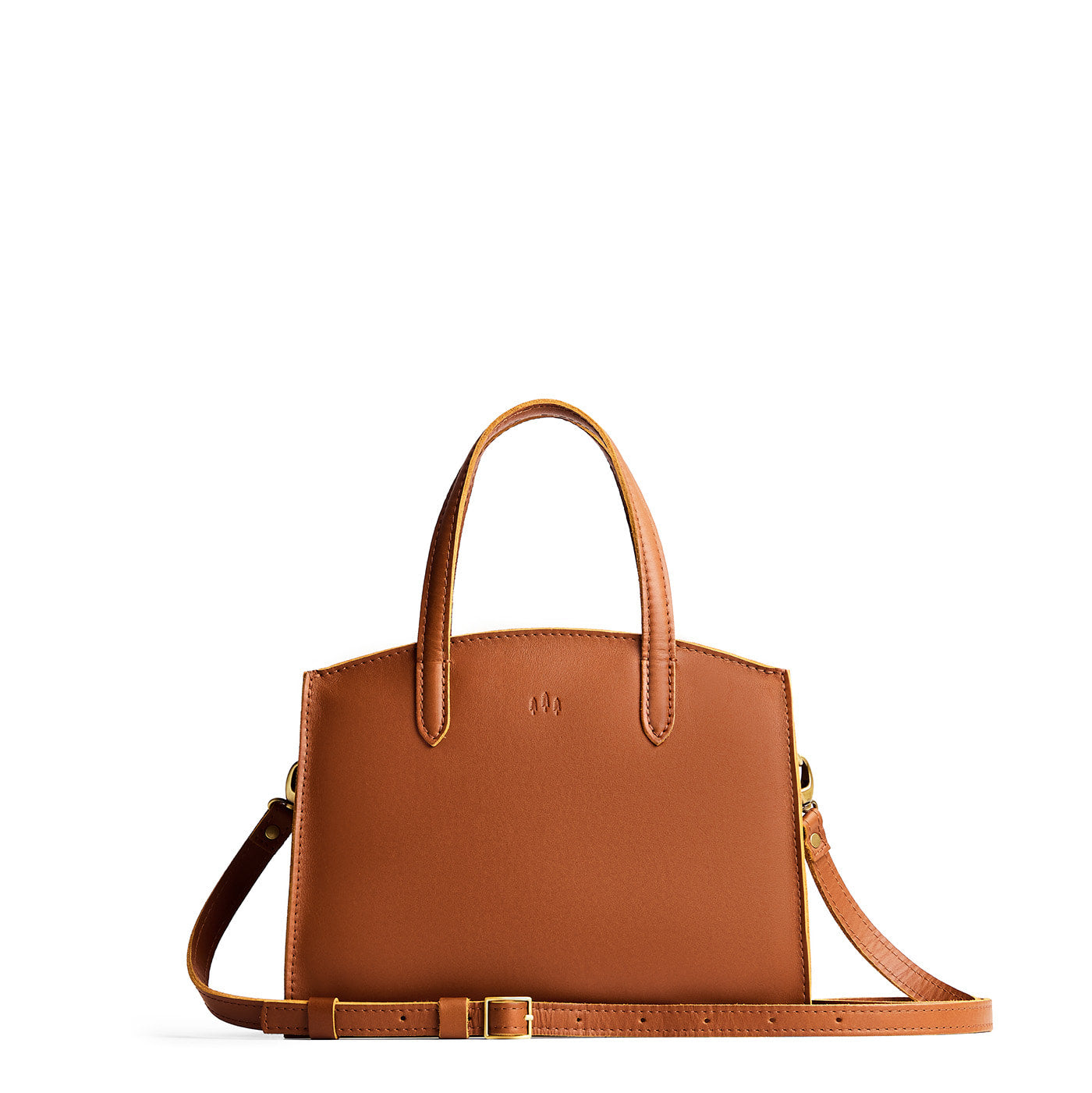 Honey*Medium | Leather tote bag with handles, adjustable crossbody strap, zipper top, and two back pockets