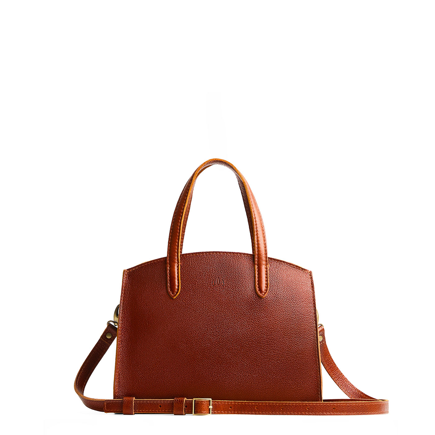 Nutmeg*Medium | Leather tote bag with handles, adjustable crossbody strap, zipper top, and two back pockets