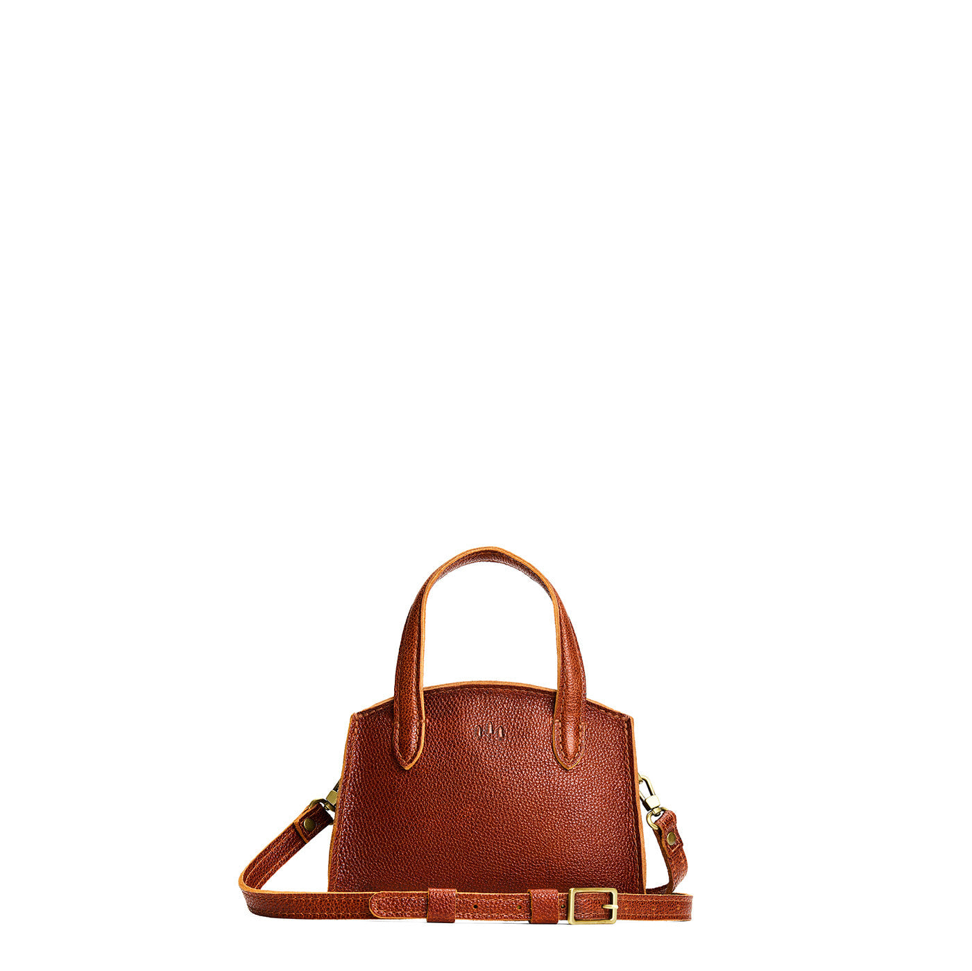 Nutmeg*Mini | Leather tote bag with handles, adjustable crossbody strap, zipper top, and a back pocket