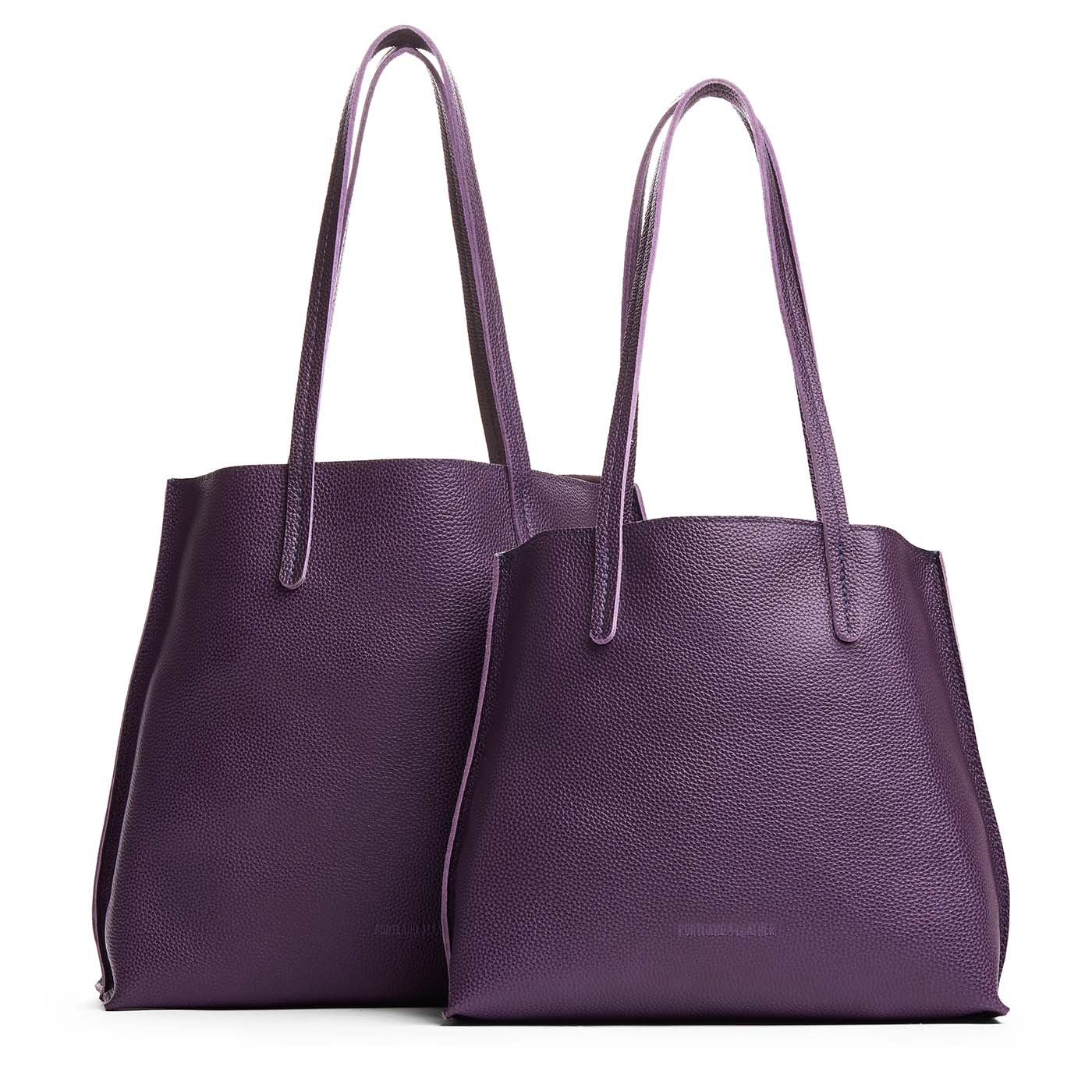 Empire | Side by side comparison of both sizes of leather totes
