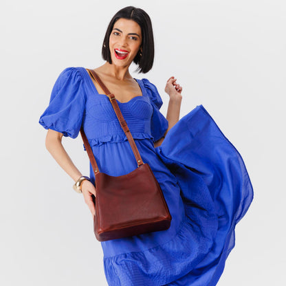 Cinnamon Bear | symmetrical bucket bag with latch closure and removable crossbody strap