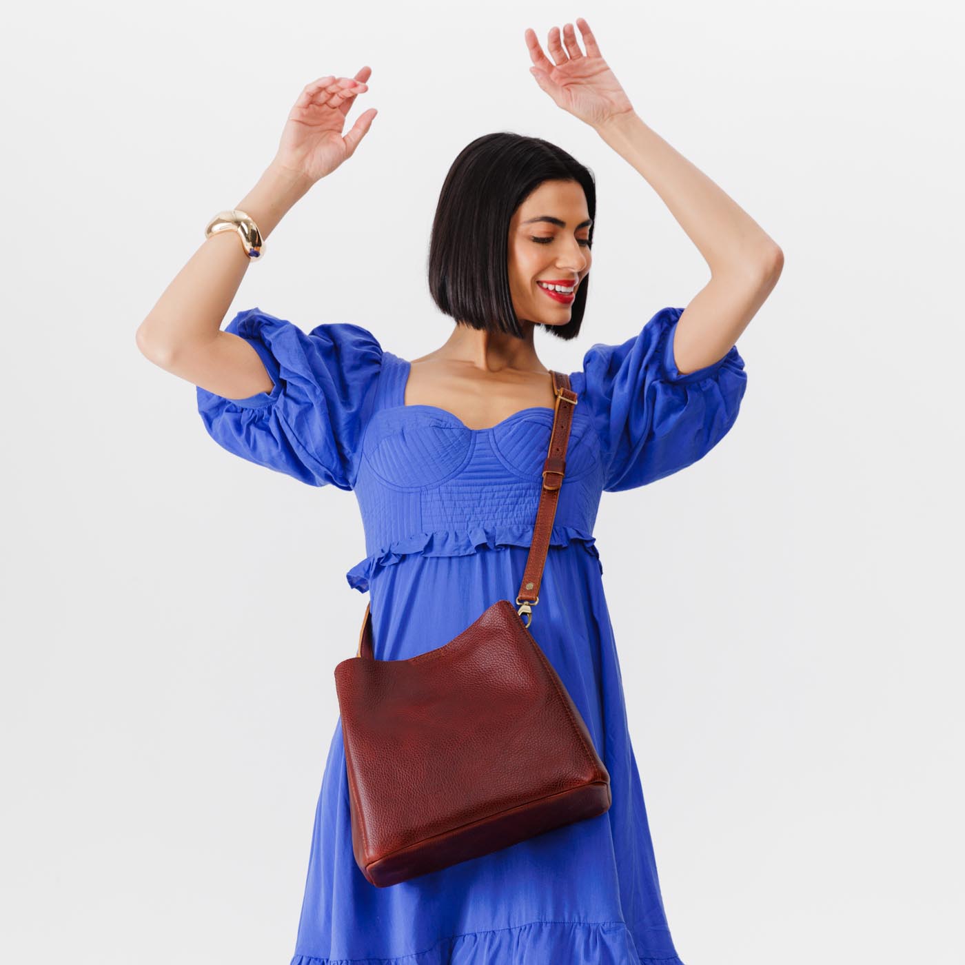 Cinnamon Bear | symmetrical bucket bag with latch closure and removable crossbody strap