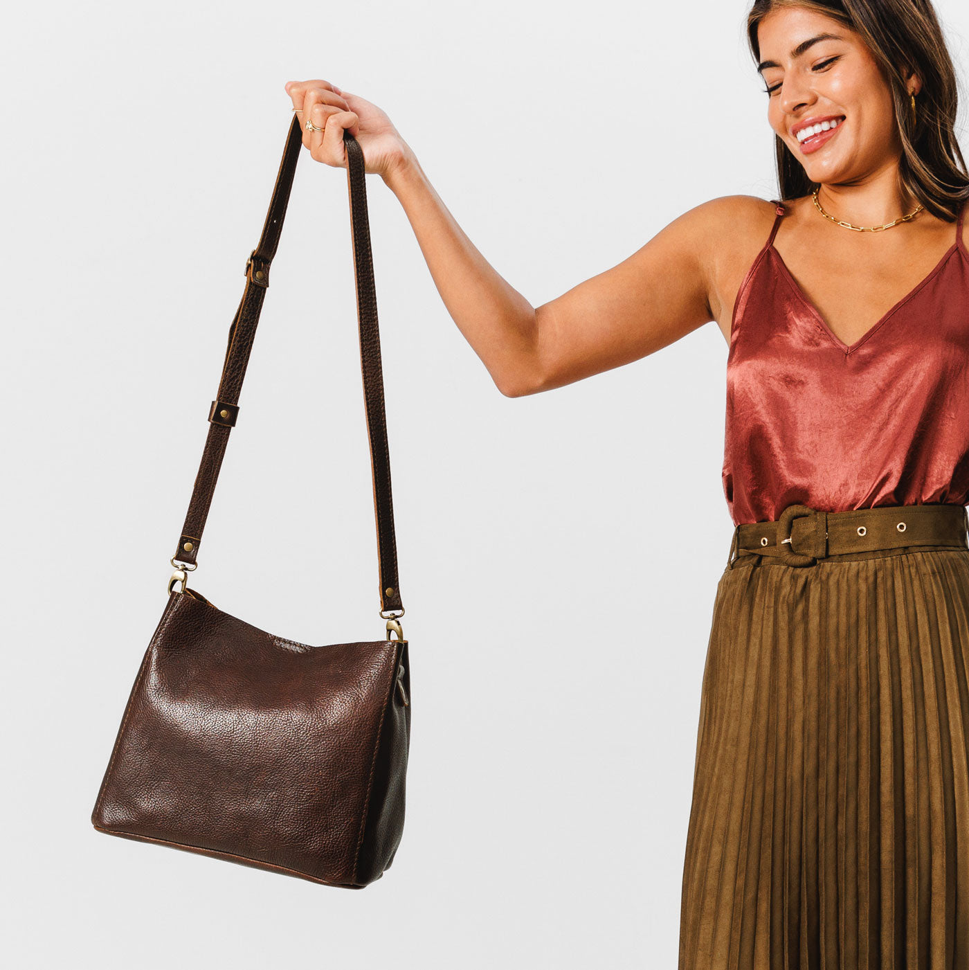 Coldbrew | symmetrical bucket bag with latch closure and removable crossbody strap