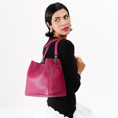 Cosmo | symmetrical bucket bag with latch closure and removable crossbody strap