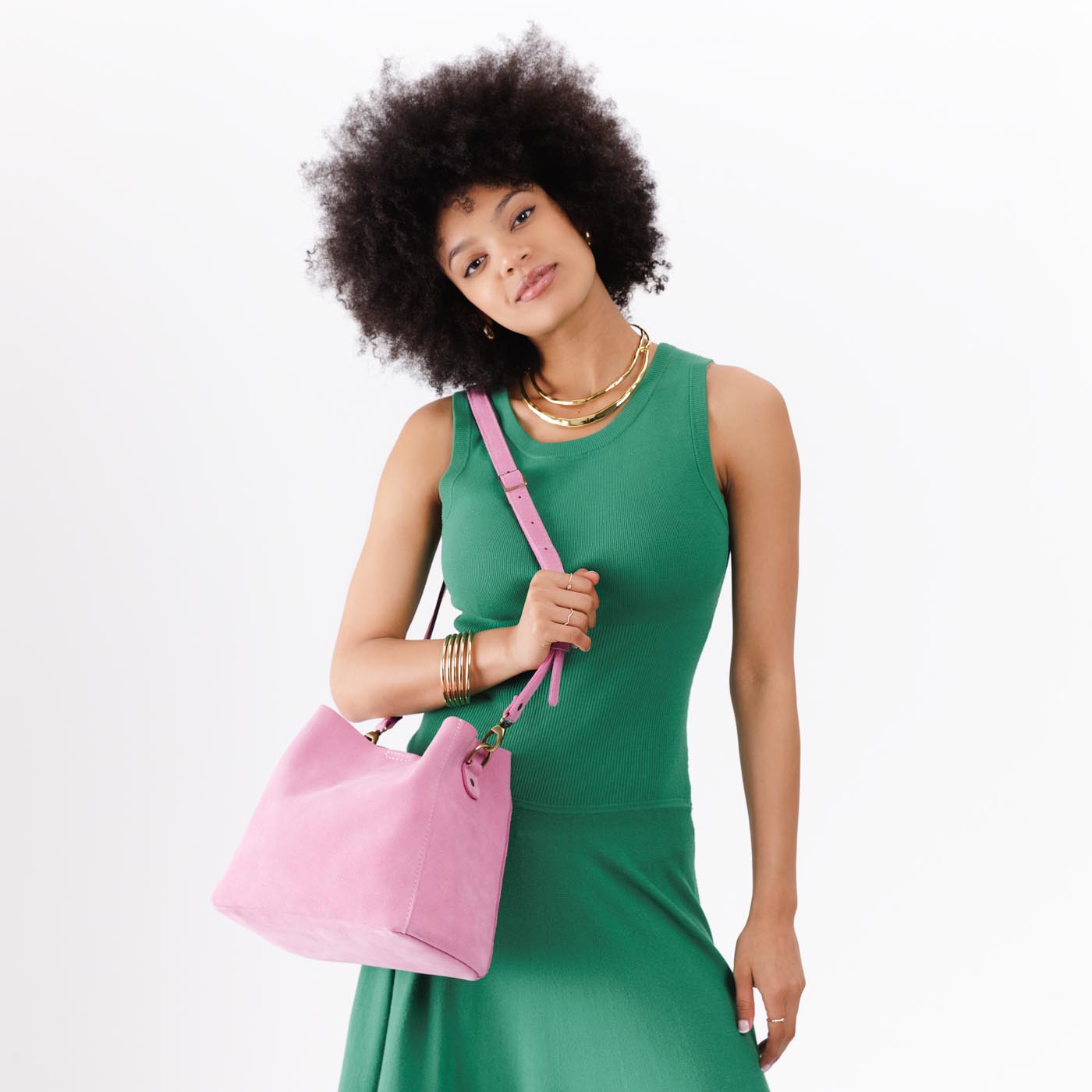 Pink Suede | symmetrical bucket bag with latch closure and removable crossbody strap