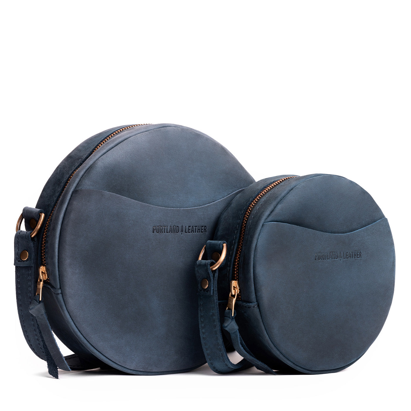 Deep Water | Size comparison image of small and large circle shaped crossbody bags with top zipper