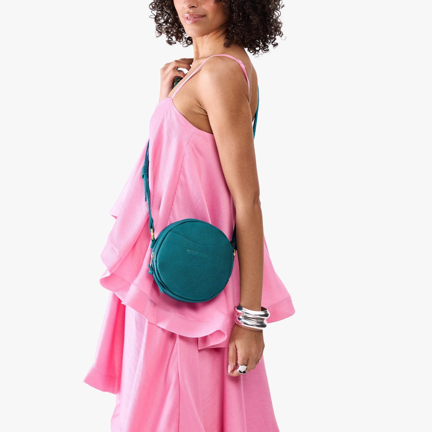 Aquarius*Small | Model wearing circle shaped crossbody bag with top zipper