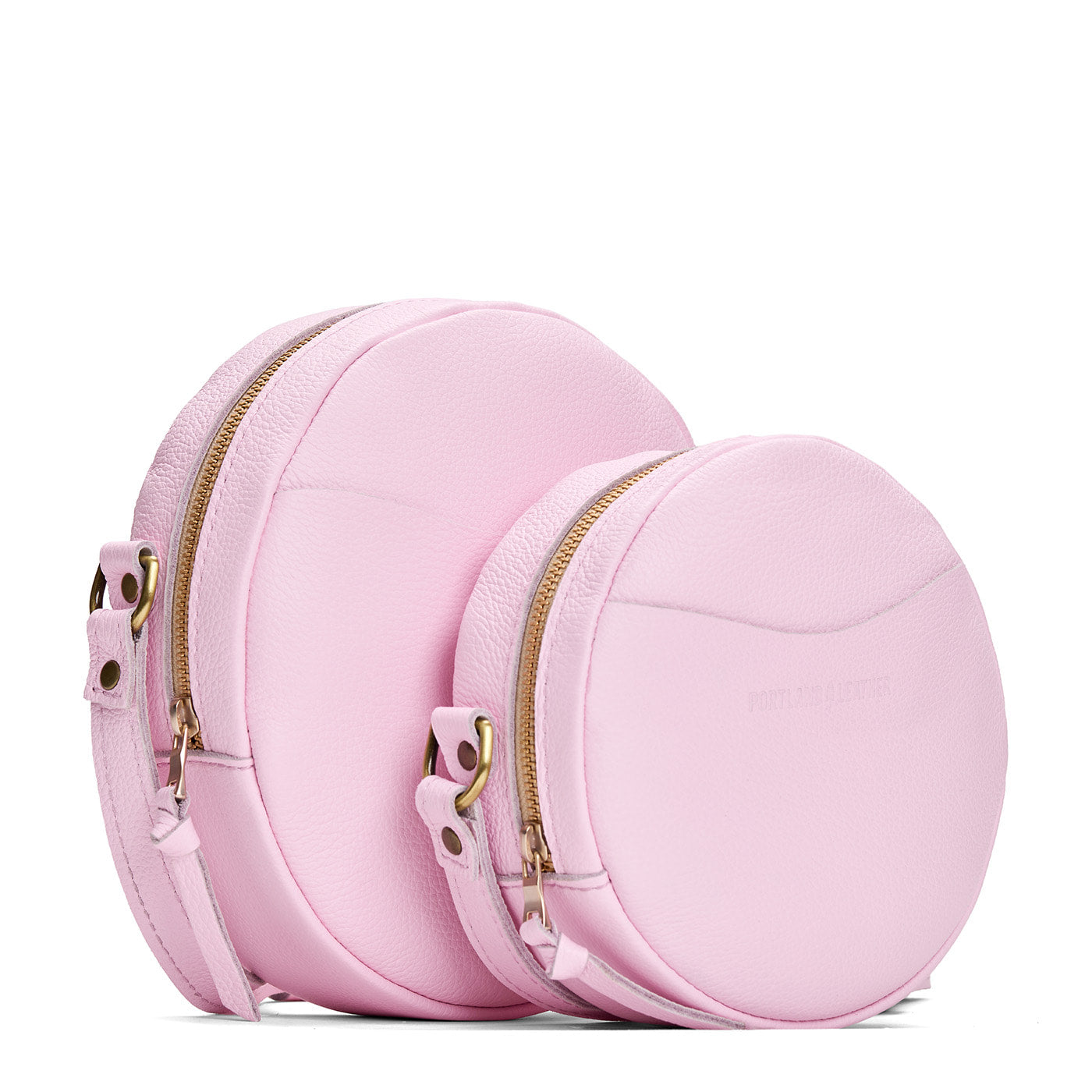 Pinkaboo | Comparison of both sizes of circle shaped crossbody bag with top zipper