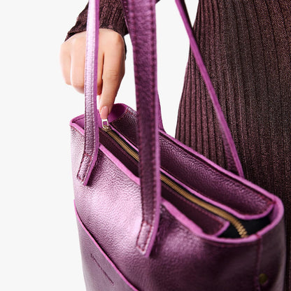 Ultra Violet*Zipper | Model holding medium Tote with dual shoulder straps and crossbody strap