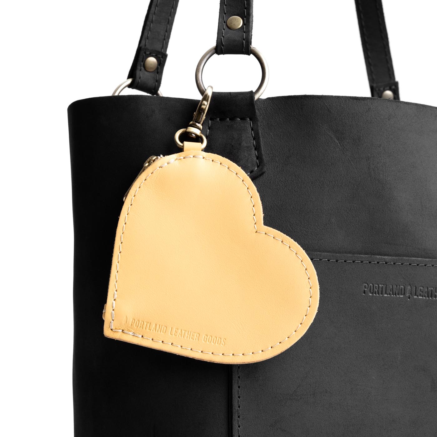 Champagne | Heart-shaped leather pouch keychain with zipper top and lobster clasp