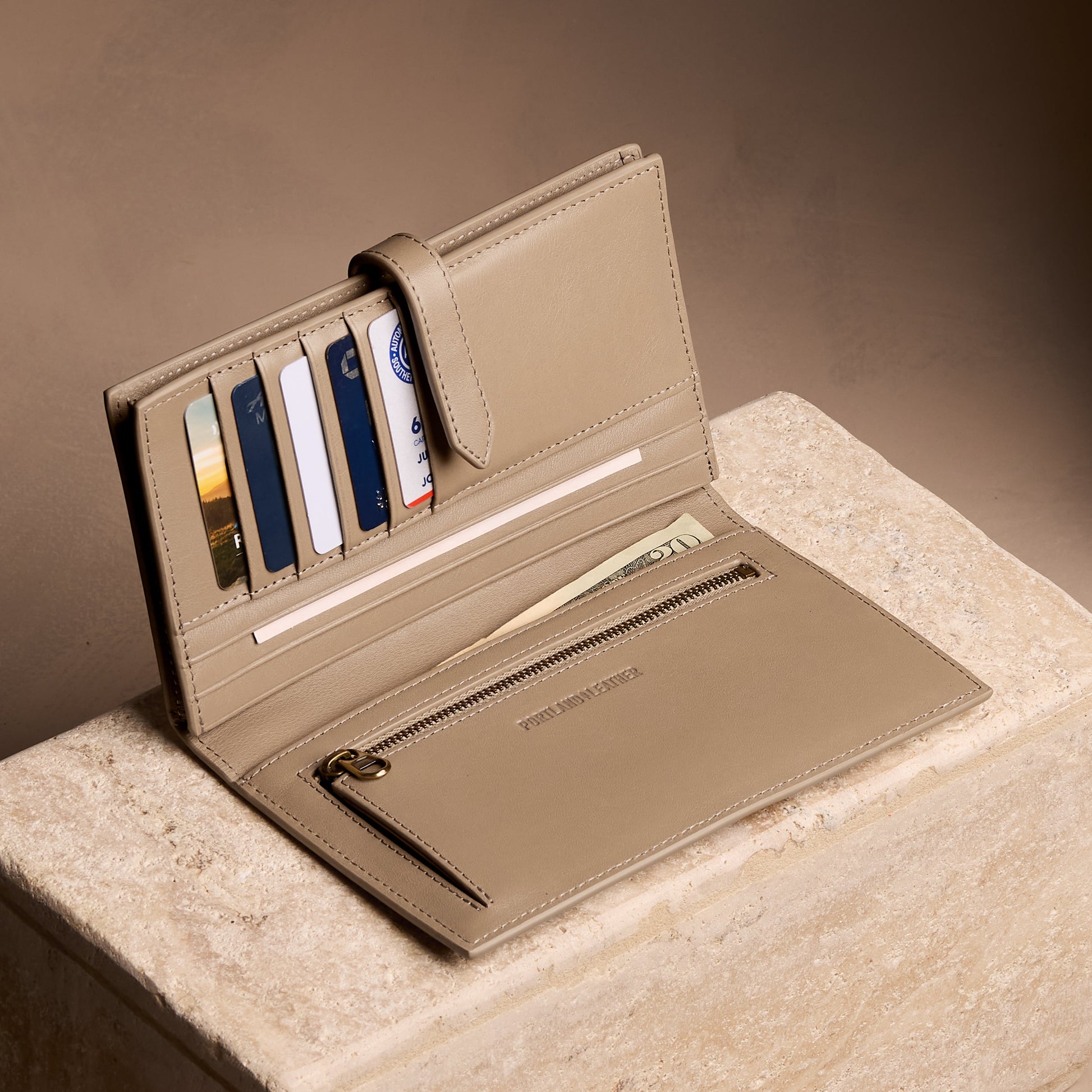 Satine*Extra Large | Leather bifold wallet with a strap and bar closure
