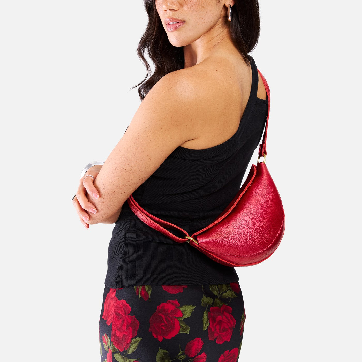 Reba Red*Small | Model wearing half circle shaped sling bag