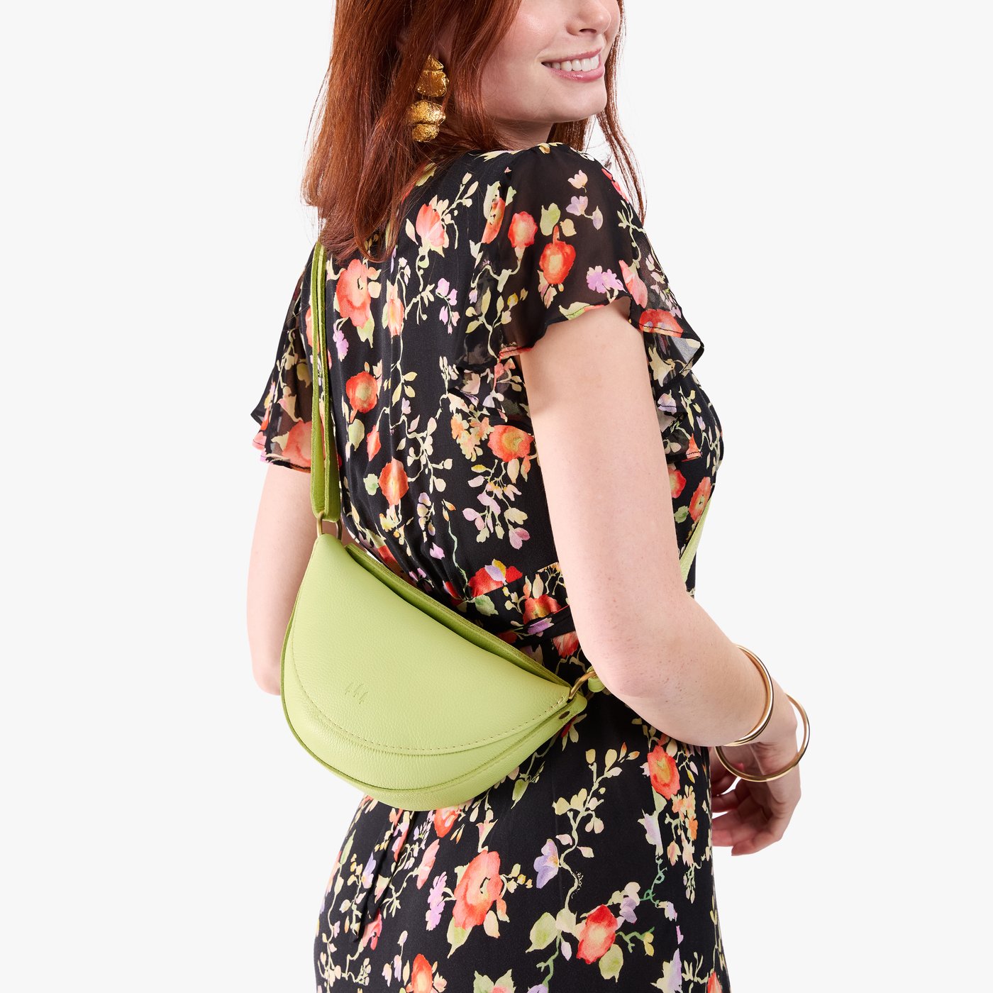 Shadow Lime*Small | Model wearing half circle shaped sling bag