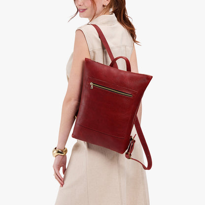 Chili Red | Model wearing rectangular slim leather laptop backpack