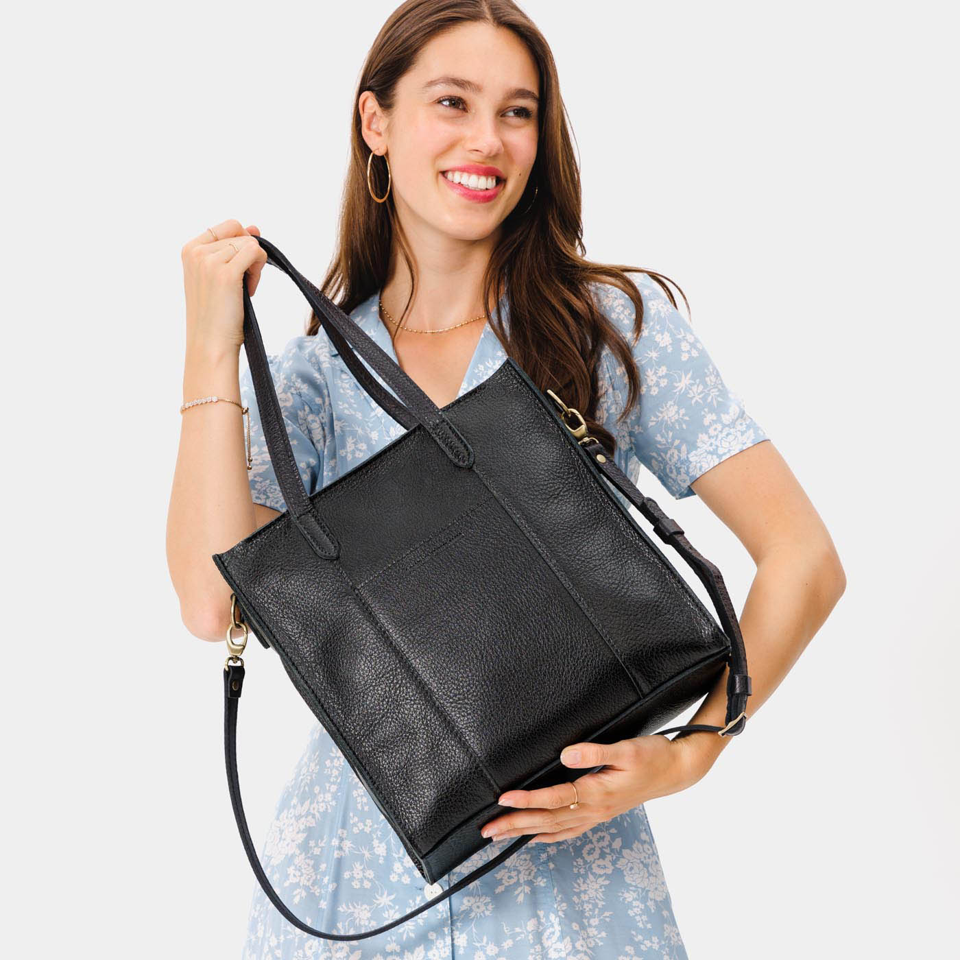 Pebbled--black*North/South | Structured large tote bag with overlapping panels and crossbody strap