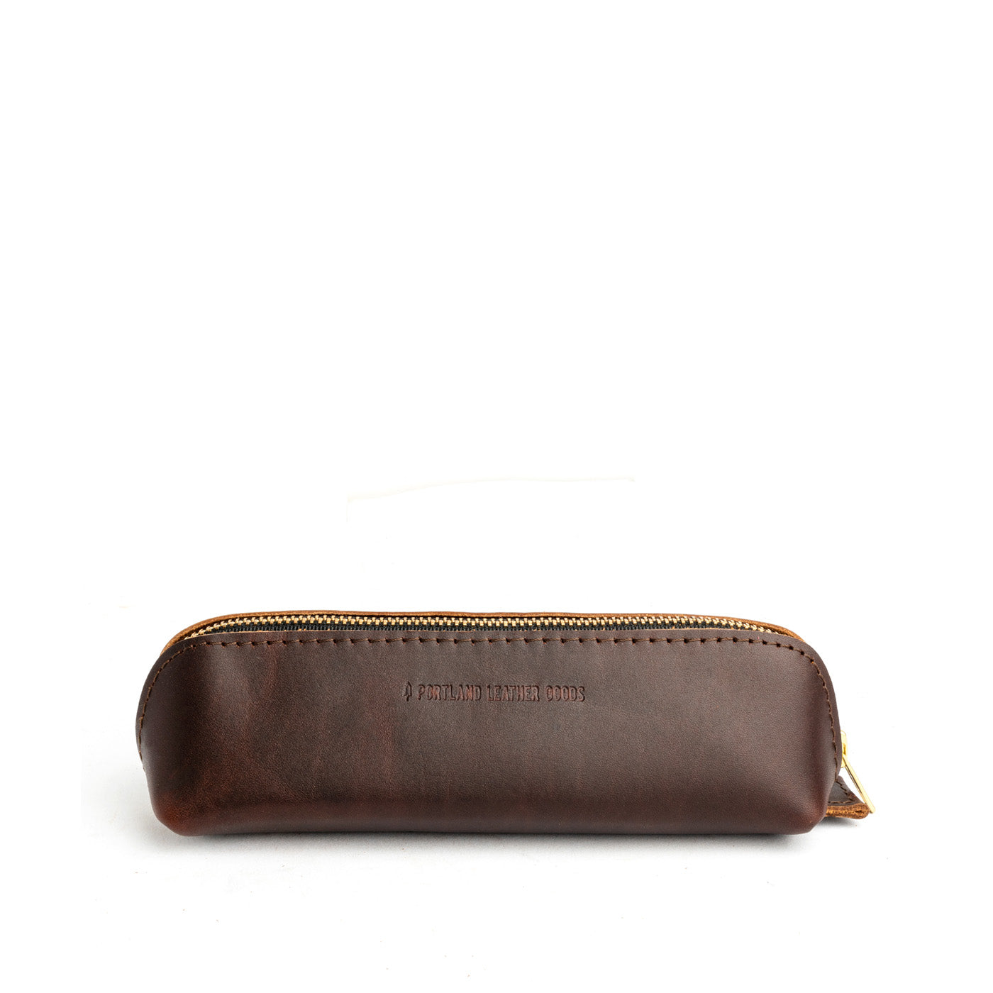 All Color: Grizzly | Leather pouch with curved seams and top zipper