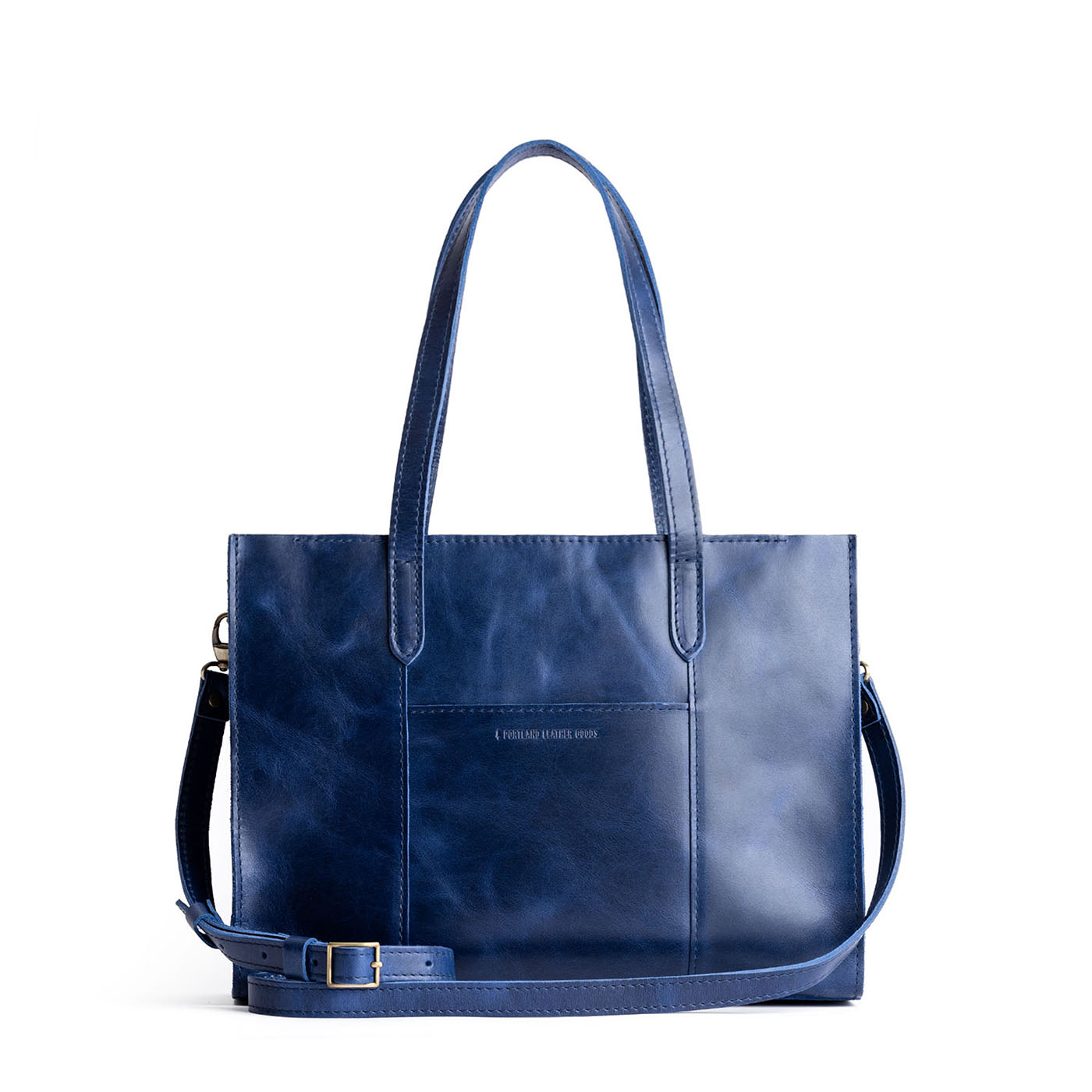 Cowboy Blue*East/West | Structured wide tote bag with overlapping panels and crossbody strap