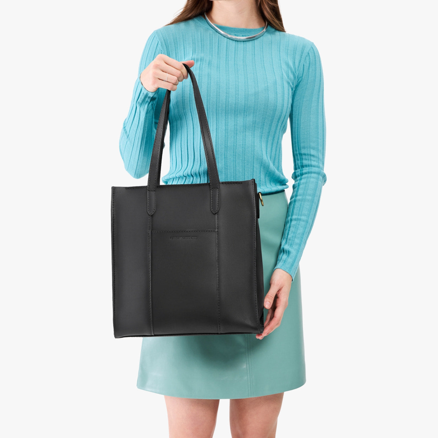 Black*North/South | Structured large tote bag with overlapping panels and crossbody strap