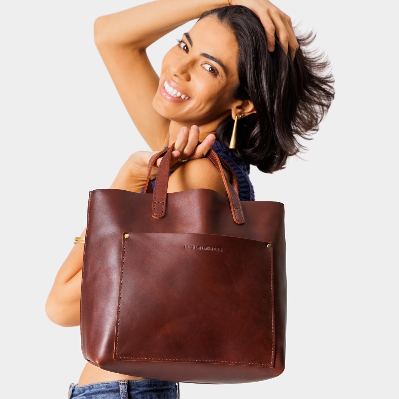 Cognac | Midsize crossbody tote with handles and a pocket