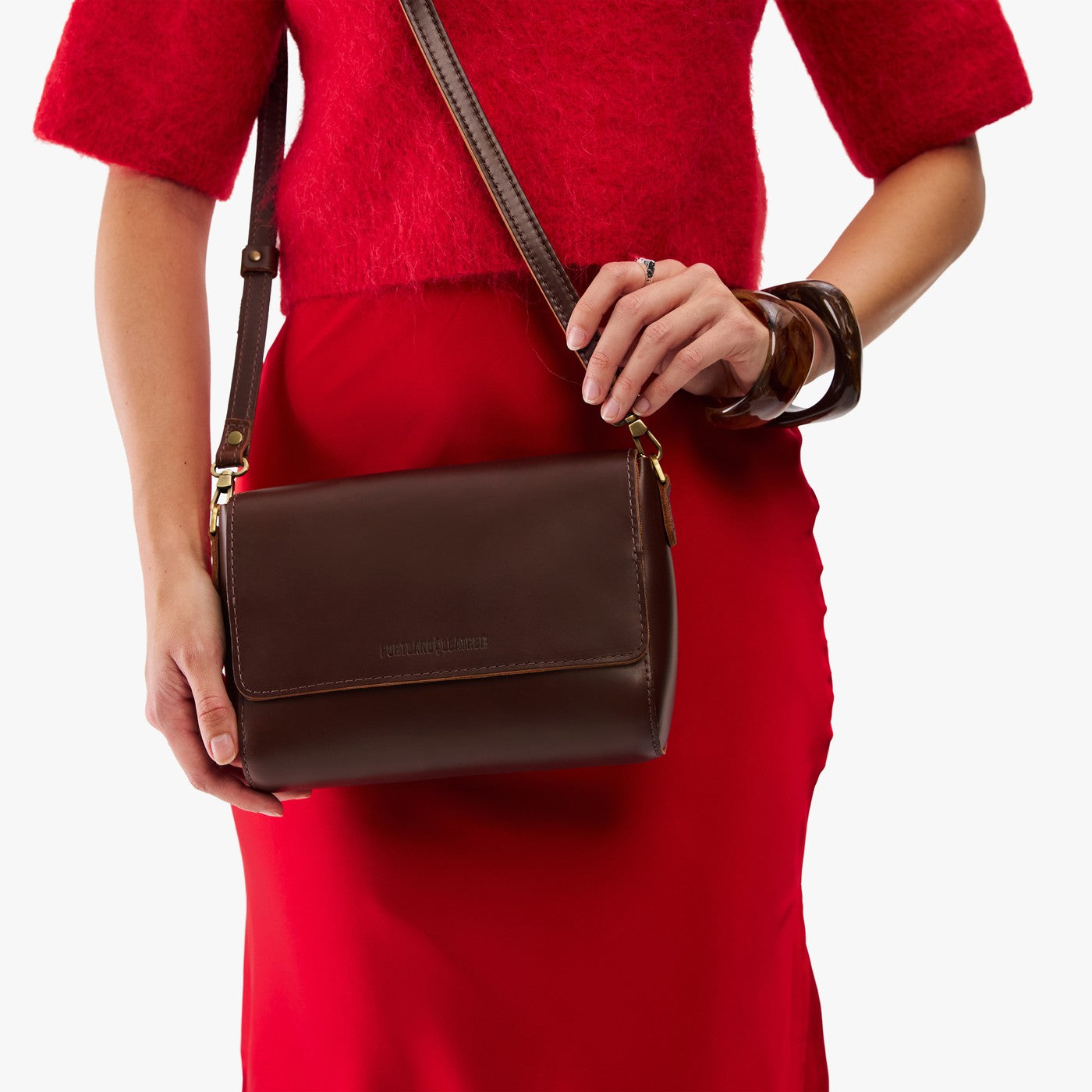 Chocolate Brown*Medium | Model Wearing Small Leather Crossbody Bag with Magnetic Messenger Bag Closure