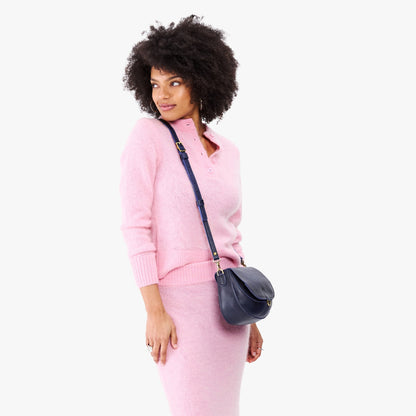 Cobalt*Small | Model wearing a petite leather Crossbody with a flap and magnetic closure