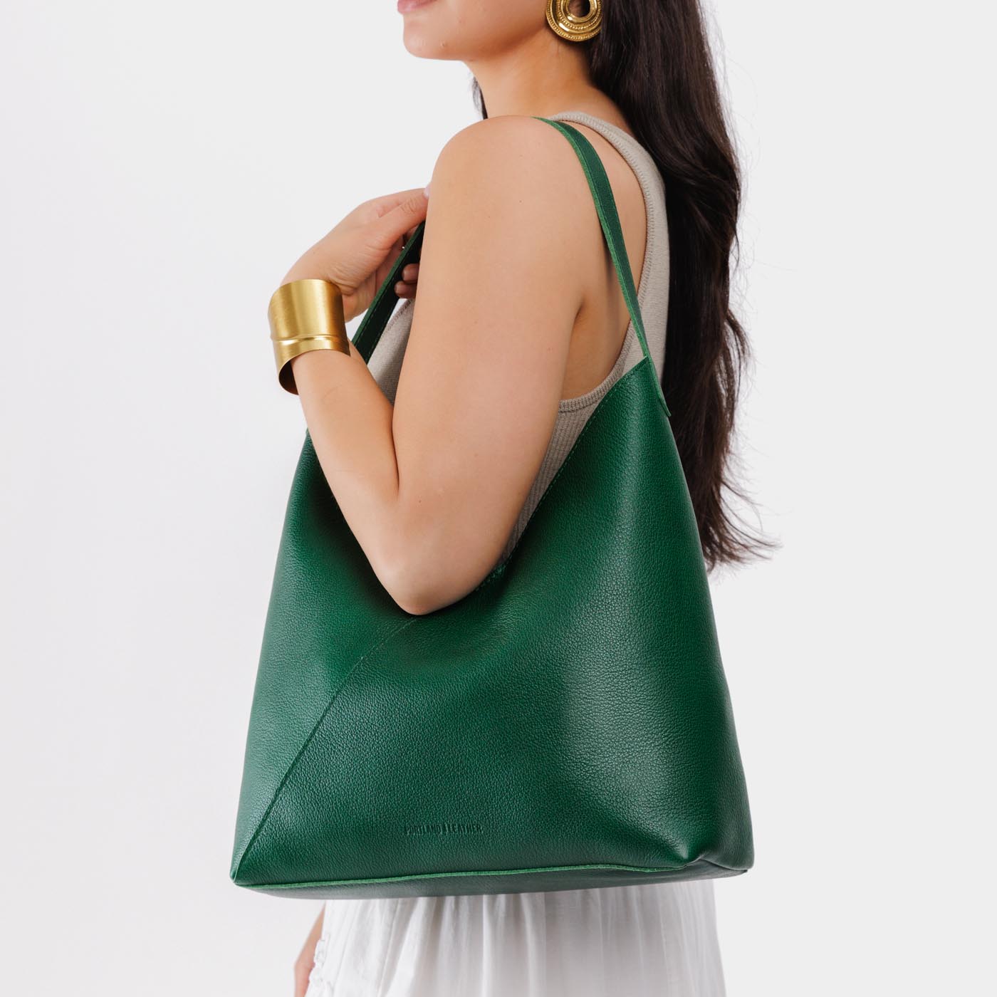 Bacalar*Oversized | Model wearing large shoulder bag with magnetic snap closure