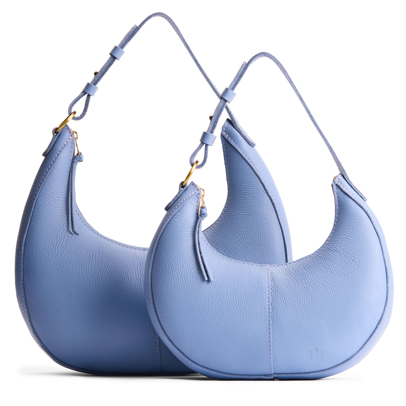 Aster | Crescent shaped shoulder bag with zipper closure and adjustable strap