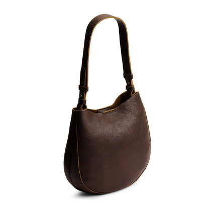 Coldbrew*Medium | Rounded shoulder bag with adjustable strap on a white background