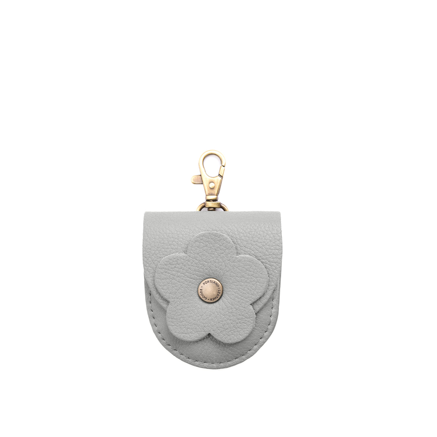 Nimbus | U shaped pouch with leather flower applique