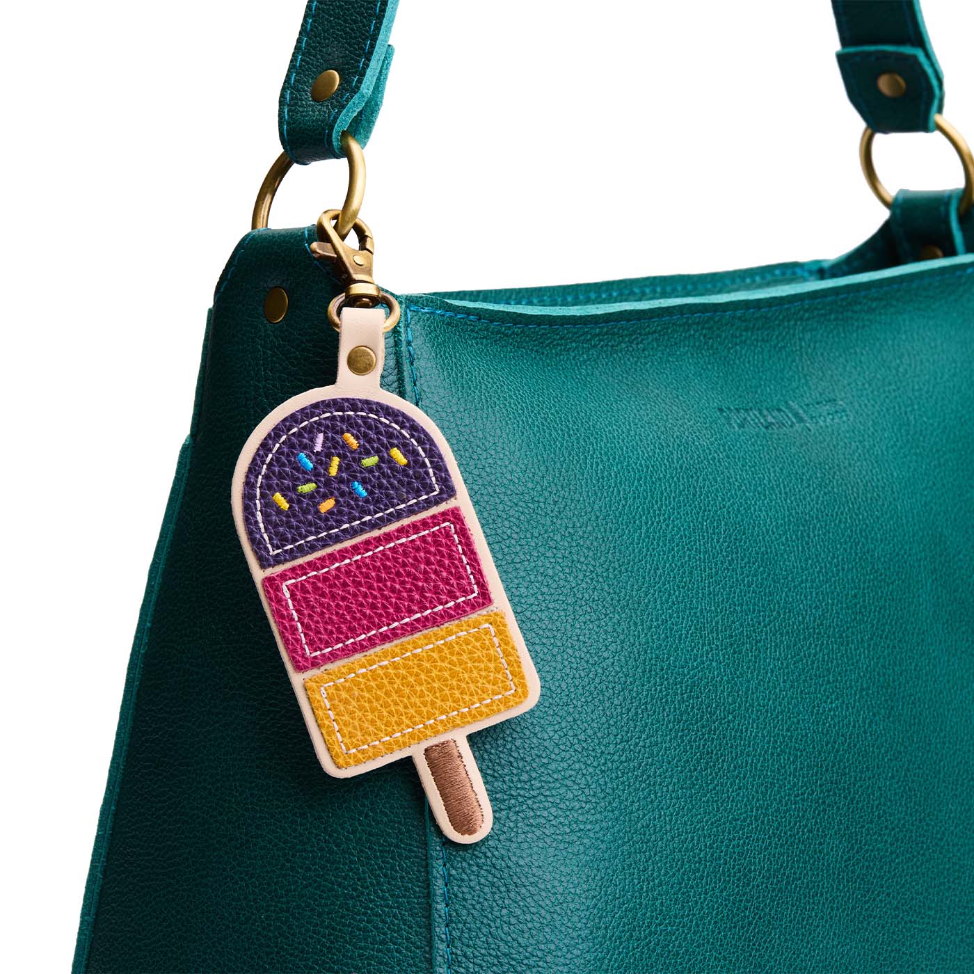 Empire | Popsicle keychain with a lobster clasp on a bag