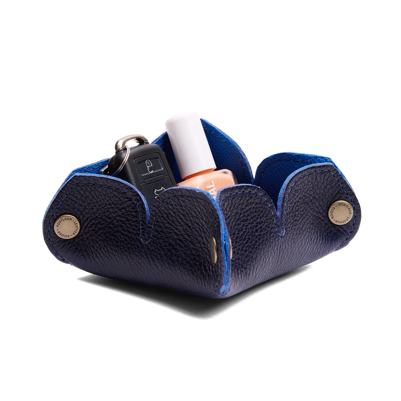 Cobalt | Desert bell-shaped foldable leather tray with snap-button corners holding items
