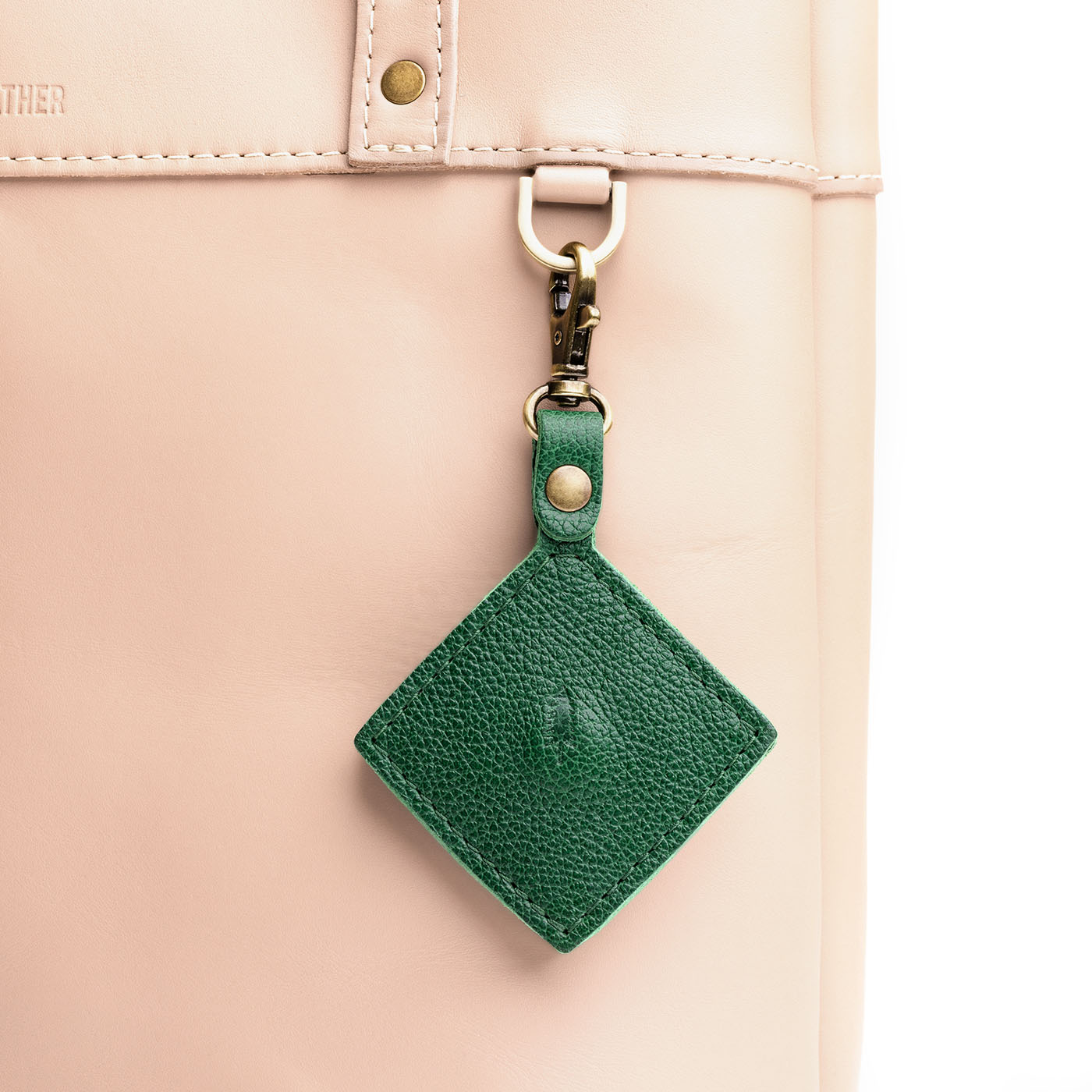Bacalar | Diamond shaped leather AirTag holder on a lobster clasp keychain
