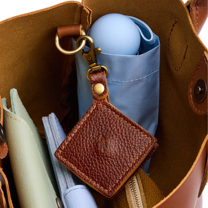 Nutmeg | Diamond shaped leather AirTag holder on a lobster clasp keychain