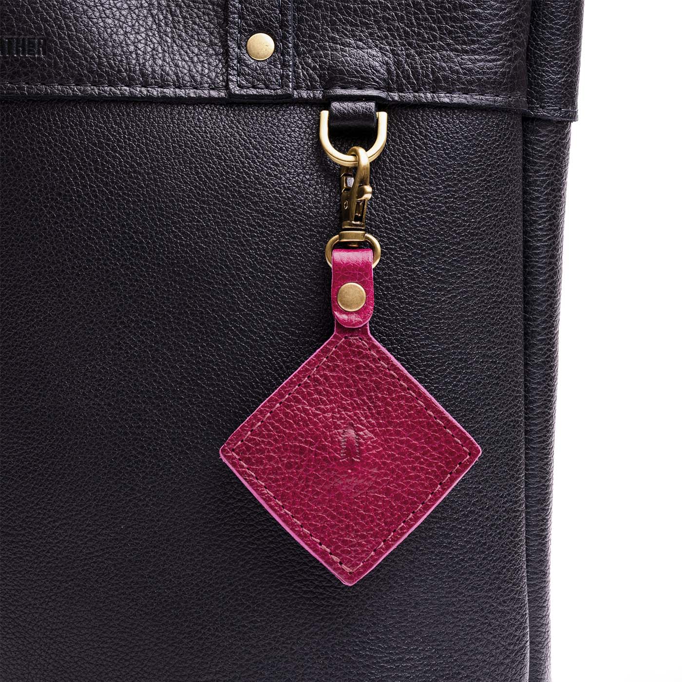 Orchid | Diamond shaped leather AirTag holder on a lobster clasp keychain
