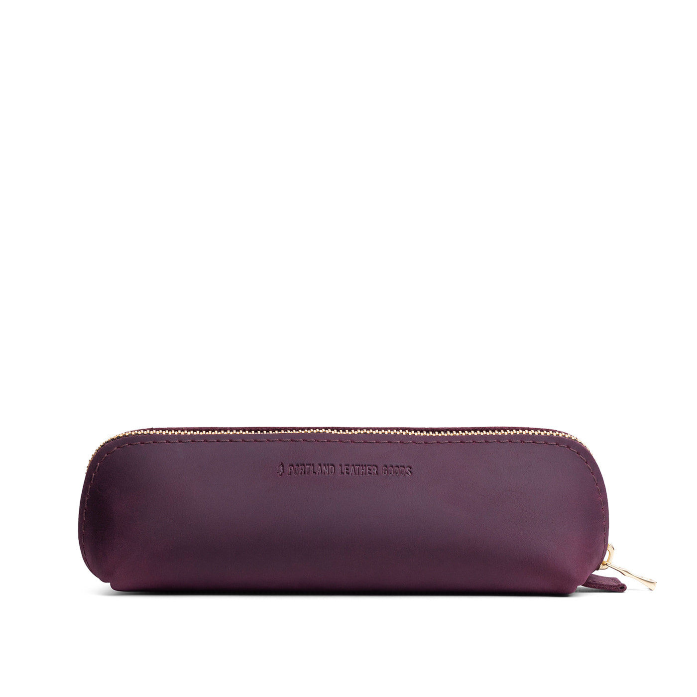 Larkspur | Leather pouch with curved seams and top zipper