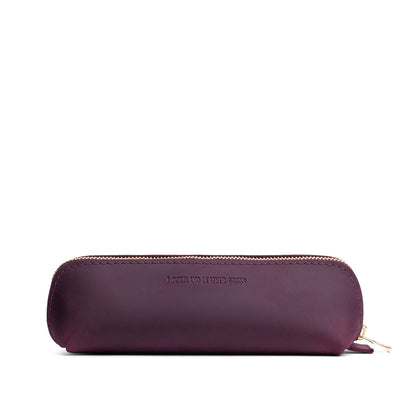Larkspur | Leather pouch with curved seams and top zipper