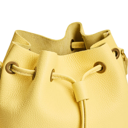 Butter Bliss| Close-up of slouchy crossbody bag with leather drawstring closure