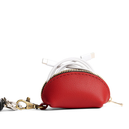 Poppy Red | Taco shaped leather pouch with zipper and swivel lobster clasp on white background
