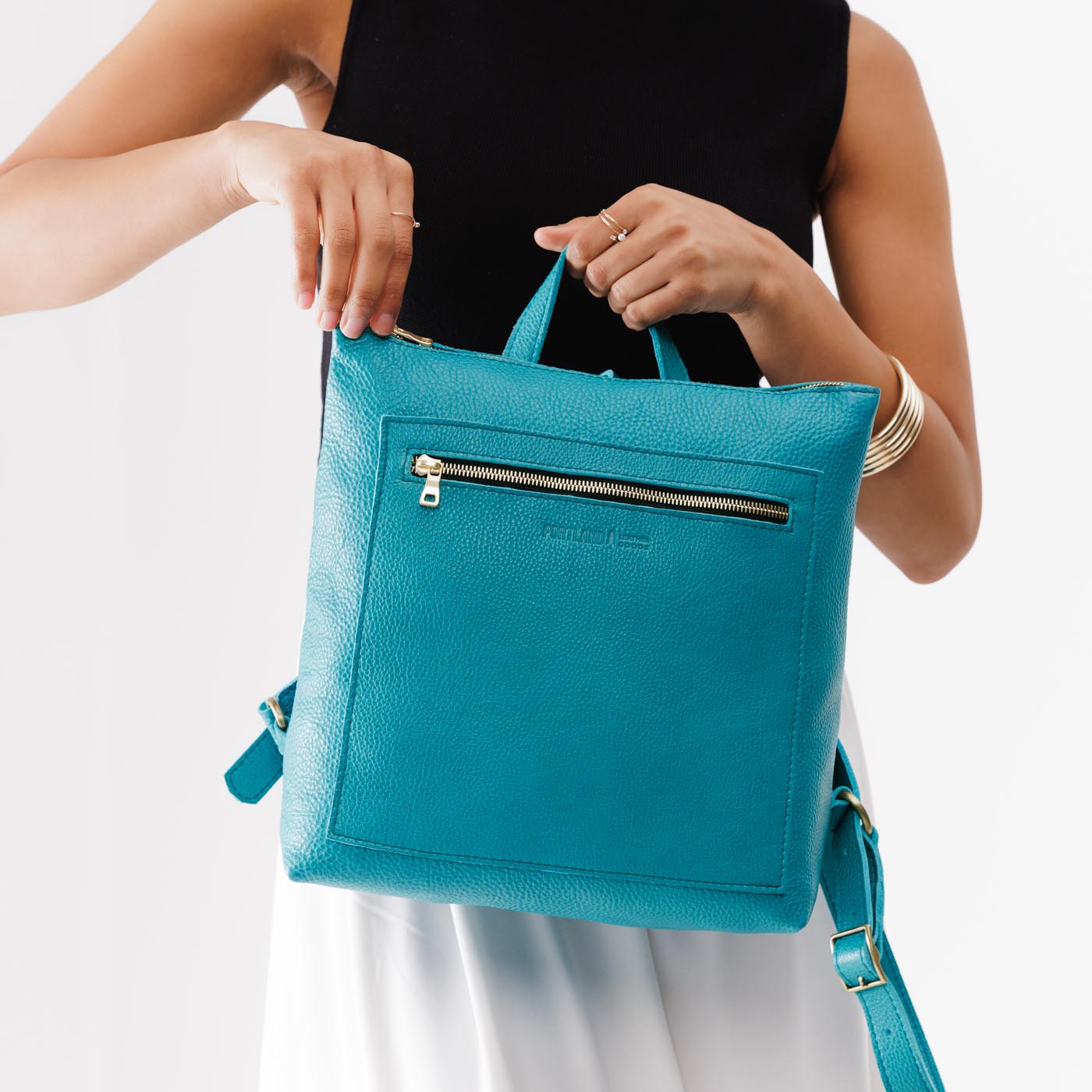 Baja*Large | Model holding square slim leather tote backpack
