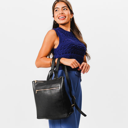 All Color: Pebbled--black*Classic | Model holding square slim leather tote backpack