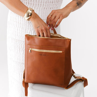 All Color: Honey*Large | Model holding square slim leather tote backpack