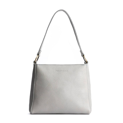 Nimbus*Small | Triangular shoulder bag with antiqued brass finished hardware